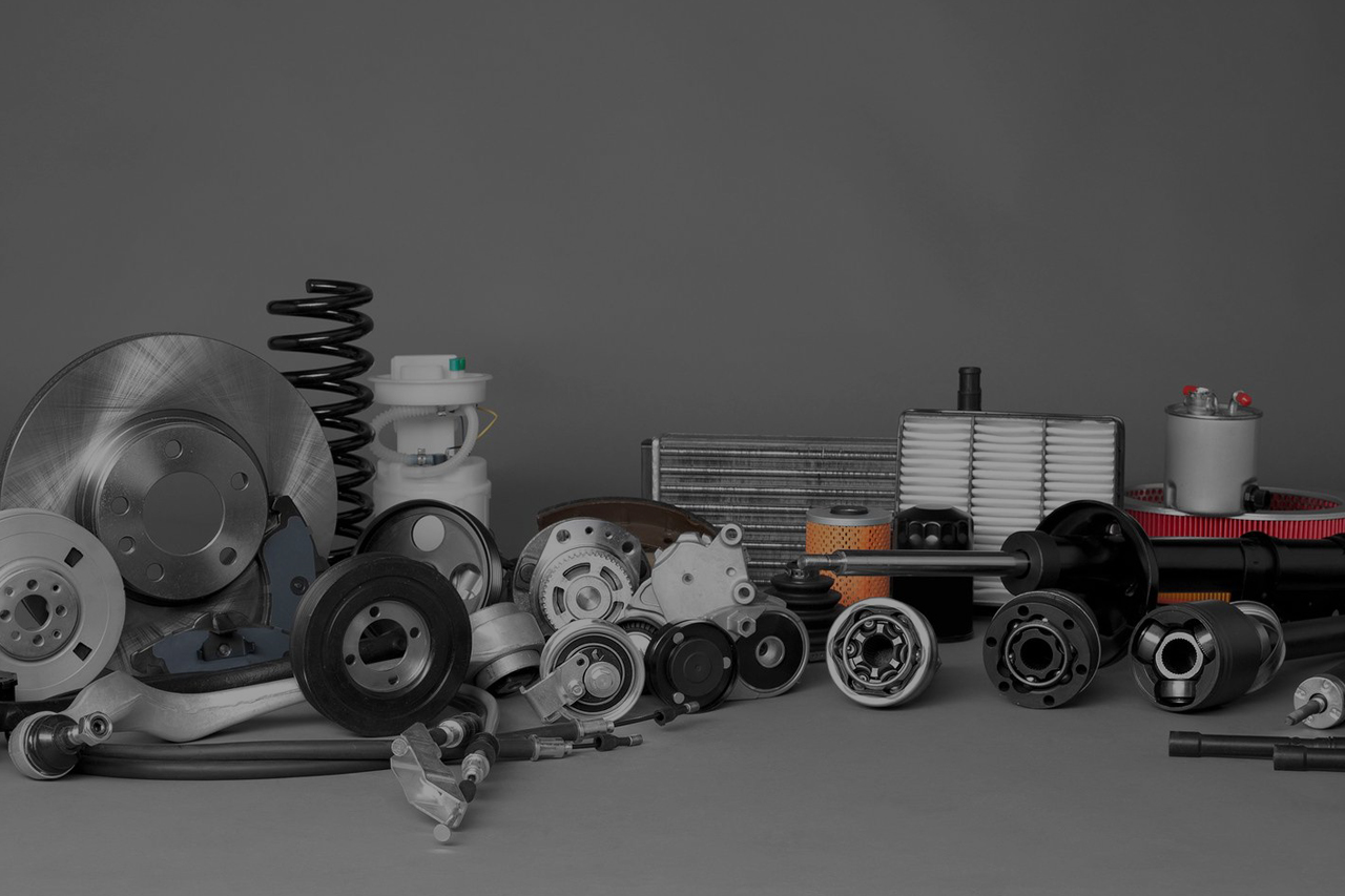 Mix of car parts of varying sizes and shapes